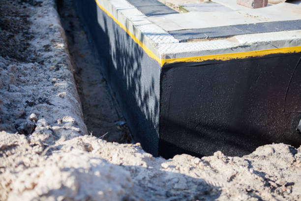 Professional Waterproofing technician working in Culver, OR